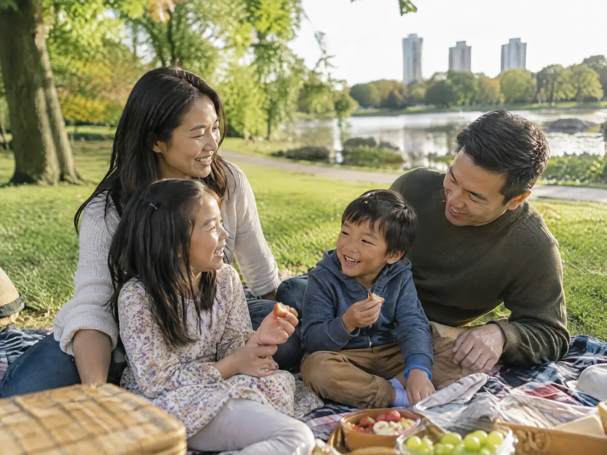 A family having a picnic in a Markham park.